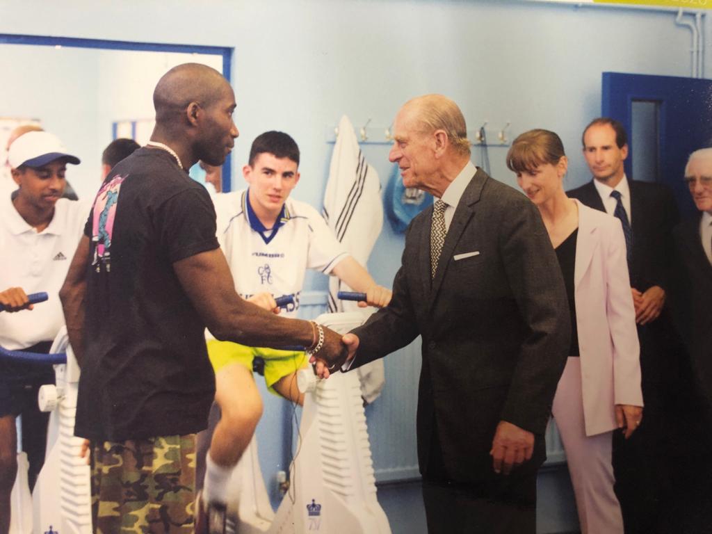 Prince Philip meeting Gus Hunte from The Brunswick Club, May 2000